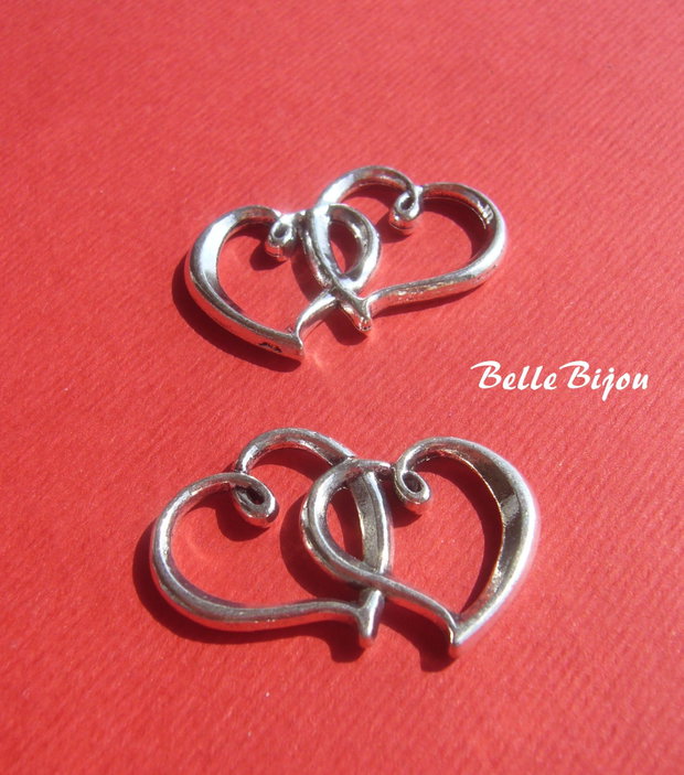 2 inimi link argintiu aprox 3x25x31 mm