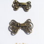 Inchizatoare ornamentala finisaj bronz aprox 16x22 mm