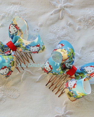 Set 2 agrafe "Hello Kitty la mare"