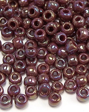 Margele TOHO, 11/0, Opaque-Rainbow Oxblood
