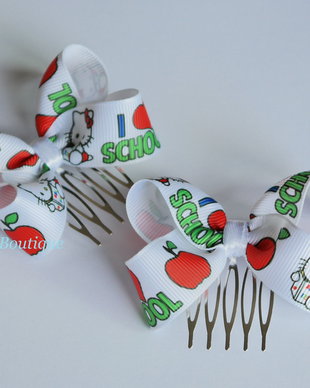 Set 2 agrafe cu Hello Kitty iubeste scoala