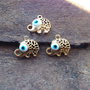 Charm elefantel aurit, evil eye 17x15mm (GPLAK 120)