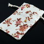 Saculeti din material textil cu flori de cires, 10x5.5cm