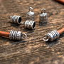 1b Capat snur argintiu antichizat  14x8mm (SALAK 158)