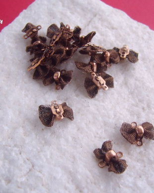 Fundita link finisaj cupru aprox 4.5x9x13 mm