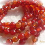 Agate  fatetate in nuantele carneolului aprox 6.5 mm