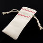Saculeti material textil, cusatura decorativa rosie, 10.5x4.5cm