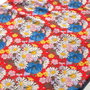 Material textil inflorat
