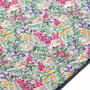 Material textil inflorat