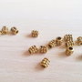 Distantier tub auriu antichizat ,4x4mm (GPLAK 096)