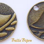 Pandantiv finisaj bronz cu pasare aprox 1.5x24 mm