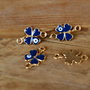 Link trifoi aurit, evil eye 20x12mm (GPLAK 125)