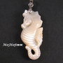 7964 - Pandantiv / charm, sidef sculptat, calut de mare, alb