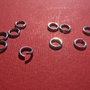 REZERVATE ...Zale nesudate din argint rodiat diametrul exterior 0.6 mm, grosime aprox 0.9 mm