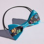 Papion pentru catei-turquoise cu labute