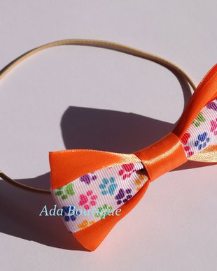 Papion pentru catei-orange cu labute colorate