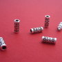Tub din argint partial antichizat cu model floral aprox 3x8 mm