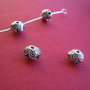 Floare cu 2 fete din argint antichizat aprox 5x7.5 mm