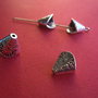 Con din argint partial antichizat aprox 9x11x11 mm