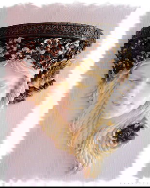 CONSOLA DE PERETE CU UN CAP DE FEMEIE