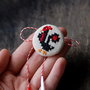 Martisor cu broderie manuala- cocos pe panza taraneasca
