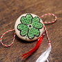 Martisor-brosa  cu broderie manuala (trifoi cu patru foi) pe panza taraneasca