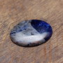 Cabochon  Sodalit natural  cu incluziuni de hematit - oval
