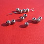 Margica metalica mica de diametru aprox 4.5 mm