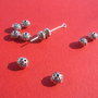 Disc metalic partial antichizat aprox 5x7 mm