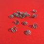 Capac din argint antichizat model floare din sarma rasucita aprox 3x7 mm