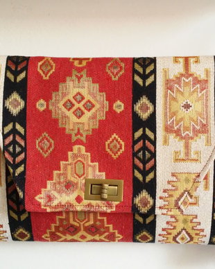 Tapestry clutch