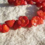 Garofita mare lucrata manual din coral rosu aprox 9-10x5 mm