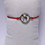Bratara snur si cabochon Fluture