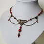 Set colier și cerei cu medalion bronz și coral roșu
