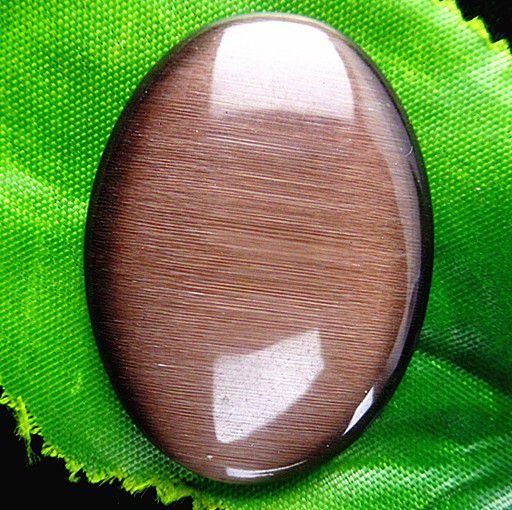 9634 - Cabochon, ochi de pisica, oval, aprox.40x30x6mm