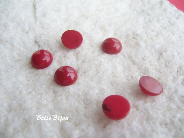 ( 2 bucati) Cabochon rosu din pasta de coral aprox 8x4 mm