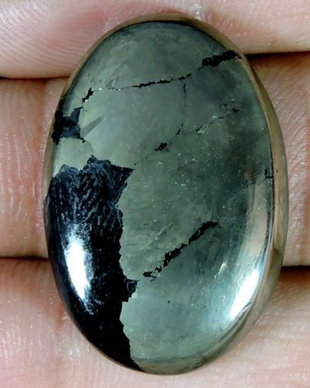 9803 - Cabochon, apache gold sau "aurul nebunilor", pirita in magnetit, 31x21x6mm