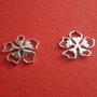 Floare medie stilizata din argint rodiat aprox 1x16x18 mm