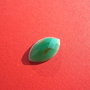 Cabochon fatetat oval ascutit din agata verde cu alb si insertii maron fatetata aprox 25x15x6.5 mm