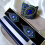 Rezervat  Corina  //SET statement  peacock feather