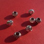 Distantier mediu - dovlecel argintiu aprox 8x6.5 mm