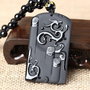 9906 - Pandantiv, obsidian negru sculptat, dragon si phoenix, 56x34mm REZERVAT