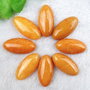 9920 - (2buc) Cabochon, jad galben orange, oval / elipsa, 30x15x7mm
