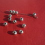 Margica metalica argintie cu valuri aprox 5x6 mm