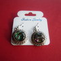 Cercei din metal finisaj satinat cu cabochon rrotund din scoica paua