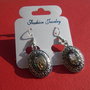 Cercei din metal finisaj satinat cu cabochon oval din scoica paua