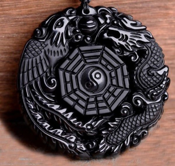 K0098 - Pandantiv, obsidian negru sculptat, dragon si pasarea phoenix, 50x50x9mm REZERVAT