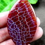 K0047 - Pandantiv, agata fire, elipsa, rosu grena - alb, 58x34x5mm