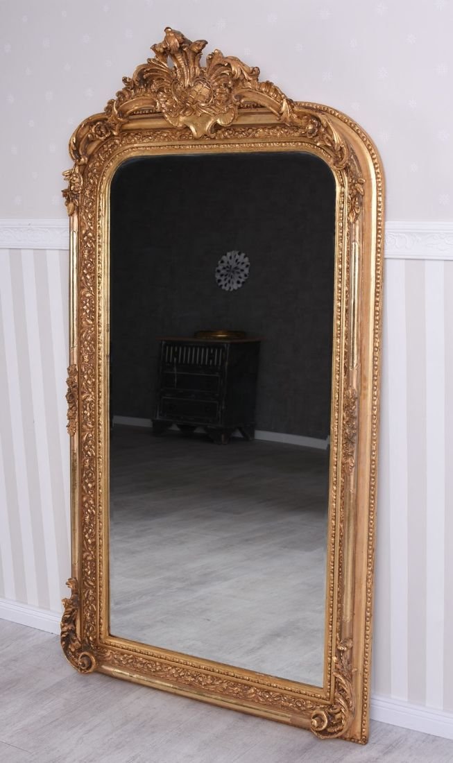 Oglinda baroc din cristal cu o rama aurie cu decoratiuni