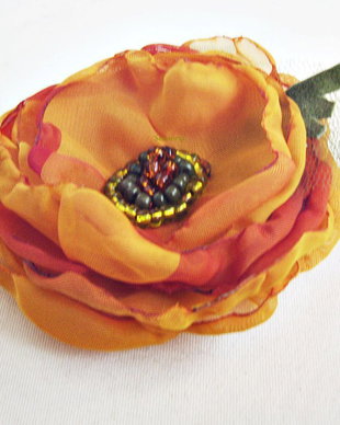 brosa floare portocalie